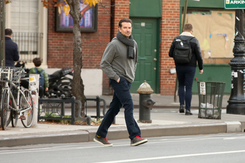 Bradley Cooper wears a knitted scarf as a jacket in New York City