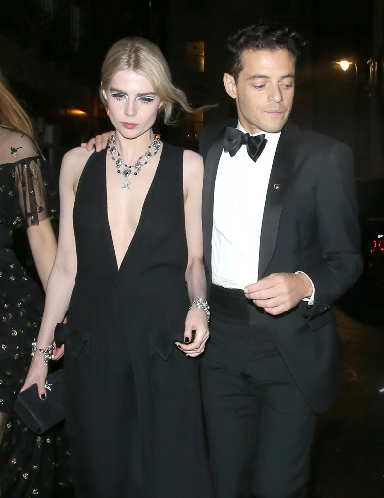 Rami Malek &amp; Lucy Boynton leave The 'No Time To Die' James Bond Party, London