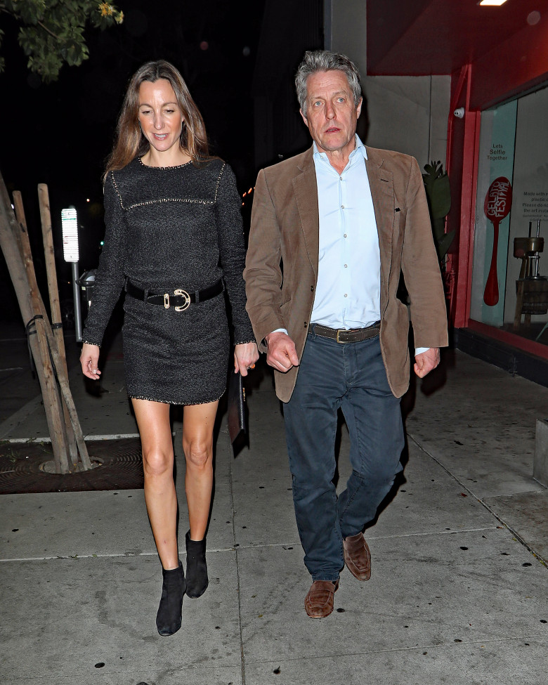 Hugh Grant is seen arriving at Craig's with Anna Eberstein