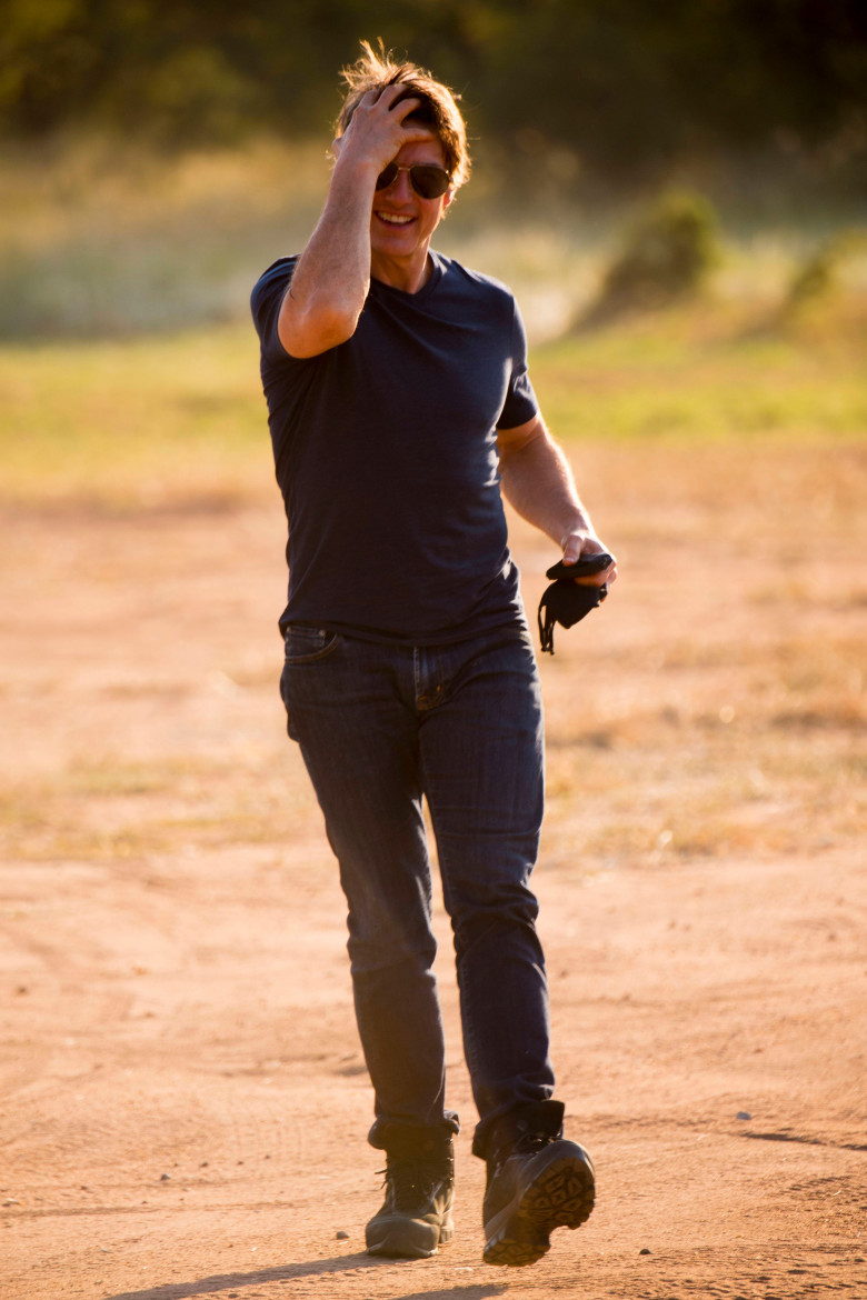 Tom Cruise greets fans after landing his helicopter in Hoedspruit, South Africa