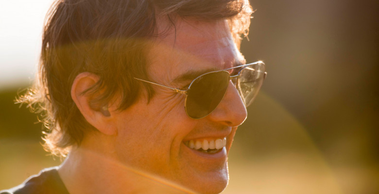 Tom Cruise greets fans after landing his helicopter in Hoedspruit, South Africa