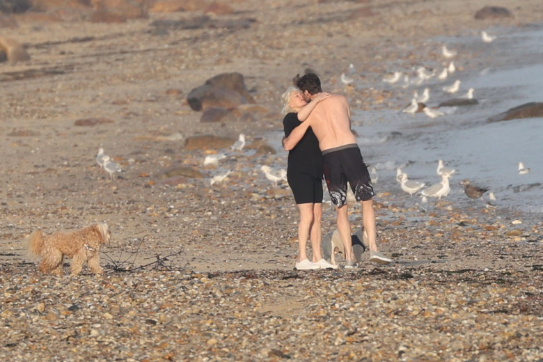 EXCLUSIVE: Hugh Jackman And Wife Deborra Pour On The PDA! The Couple Continue Ritual Of Swimming In The Frigid Winter Water In The Hamptons