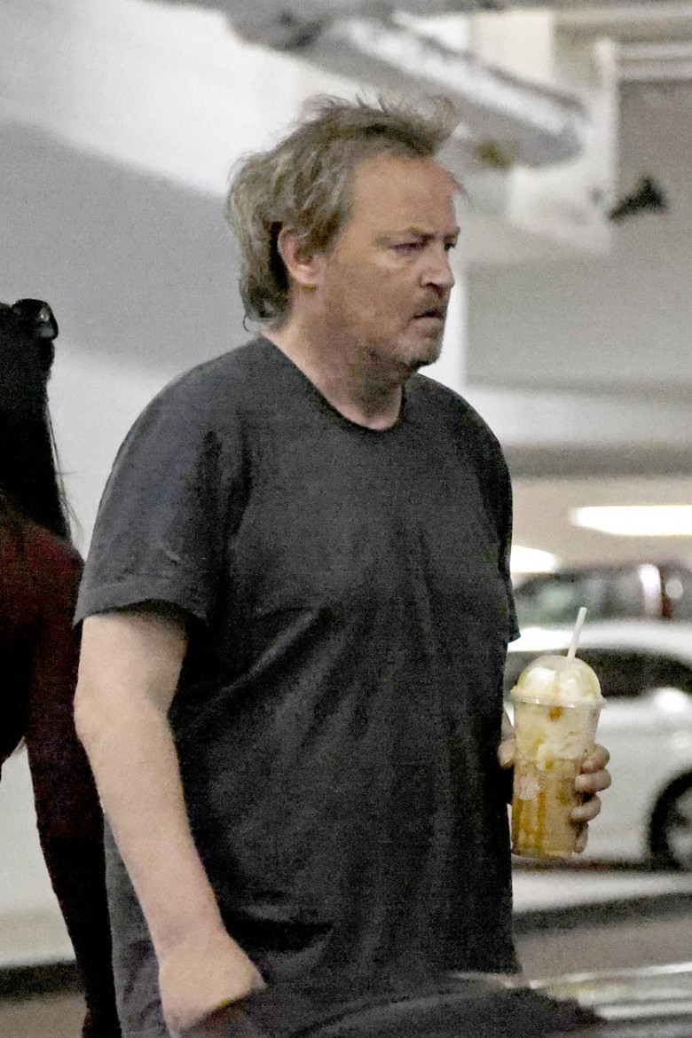Matthew Perry is seen in a rare public outing as he runs errands with a female companion in Beverly Hills.