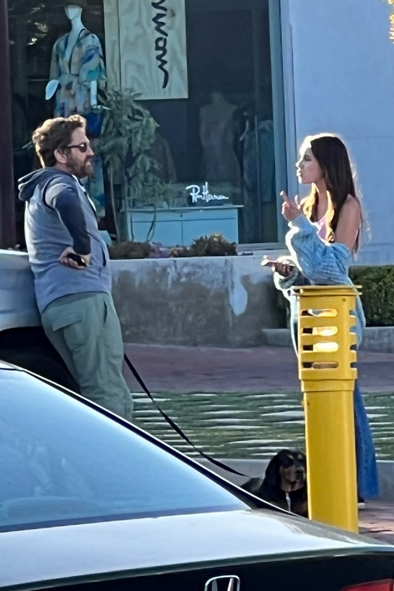 *EXCLUSIVE* Gerard Butler chats with a mystery girl while out with his dog in Malibu