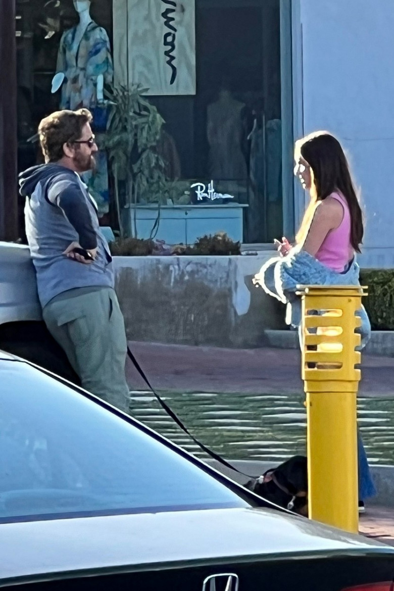 *EXCLUSIVE* Gerard Butler chats with a mystery girl while out with his dog in Malibu