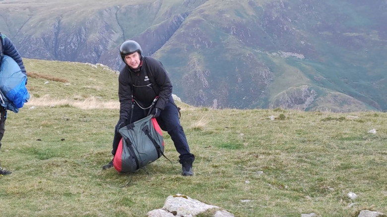 EXCLUSIVE: Hiker stunned while out walking as Tom Cruise lands in helicopter and makes parachute jump