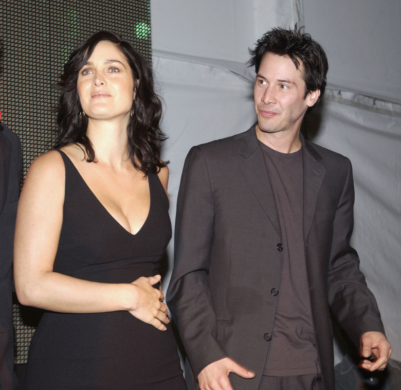 Carrie-Anne Moss and Keanu Reeves