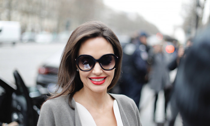 Angelina Jolie signs outside Guerlain Store in Paris