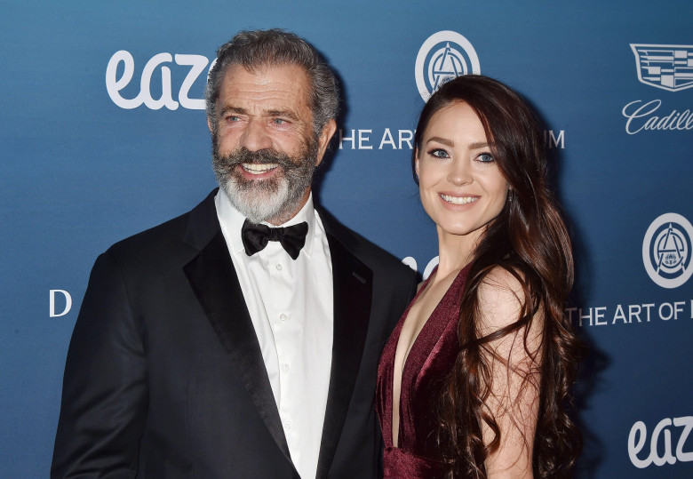 LOS ANGELES, CA - JANUARY 05: Mel Gibson (L) and Rosalind Ross attend Michael Muller's HEAVEN, presented by The Art of Elysium at a private venue on January 5, 2019 in Los Angeles, California.