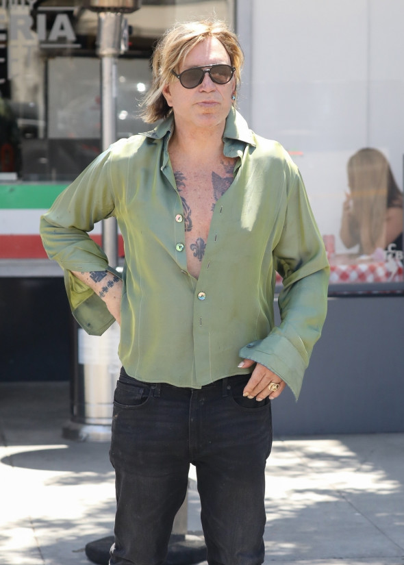 *EXCLUSIVE* Mickey Rourke shows off his chest tattoos during a lunch outing in Beverly Hills
