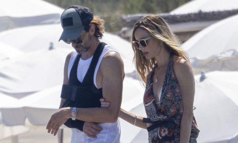 *EXCLUSIVE* American actor Adrien Brody and his partner Georgina Chapman (ex-wife of H. Weinstein) leave the beach at club 55 in Saint-Tropez on July 19, 2022.