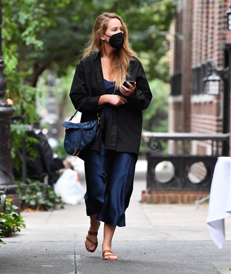 Jennifer Lawrence seen wearing a blue dress and carrying a Dior bag in New York City