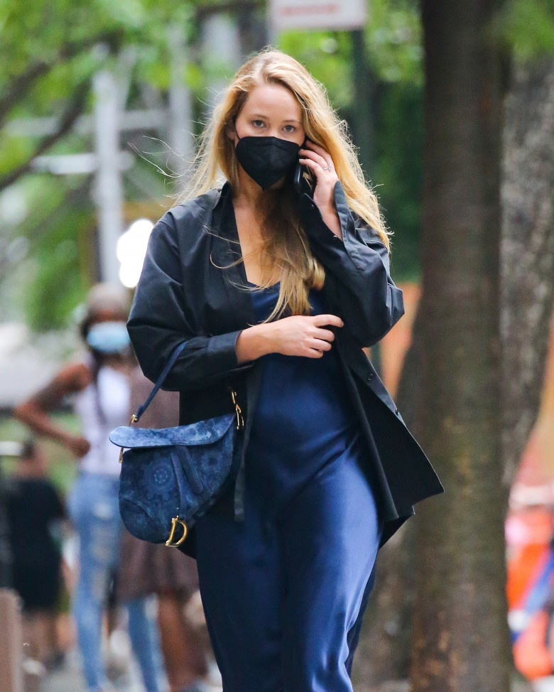 Jennifer Lawrence chats on her phone during a stroll in New York