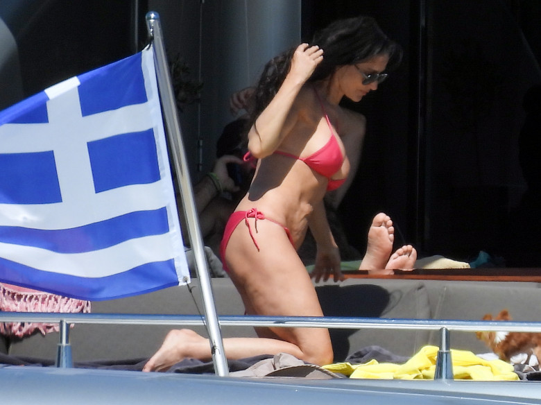 EXCLUSIVE: ** EMBARGO: strictly no web before 18:45 BST (13.45 ET) 16 Aug 2022. ** G.I. Jaw Dropping! Demi Moore Looks Sensational At 59 In A Red Bikini On Vacation In Greece