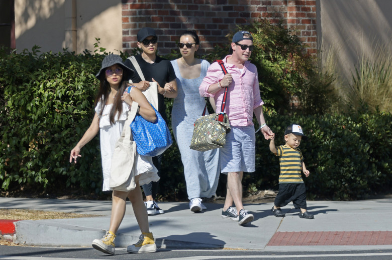 Former child superstar Macaulay Culkin is one proud papa as he enjoys a family day out with fiancŽe Brenda Song and their young son Dakota, 16 months, on a sunny afternoon in the LA suburbs.