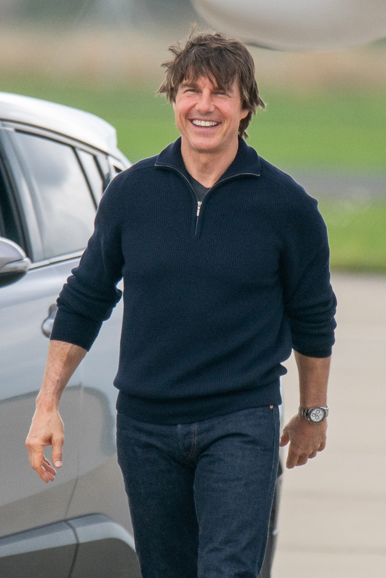 EXCLUSIVE: Great Balls Of Fire... Top Gun Star Tom Cruise Has A Scare As Smoke Billows From The End Of The Runway, Minutes After He Lands At A UK Airport