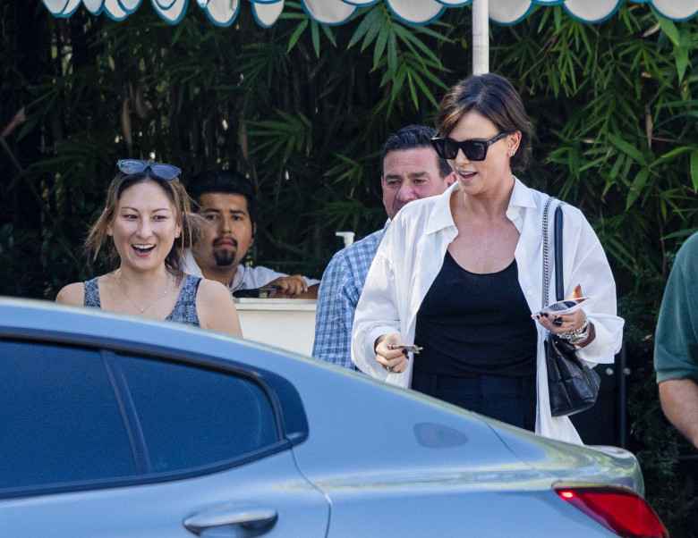 *EXCLUSIVE* Charlize Theron leaves a lunch date with friends at San Vicente Bungalows