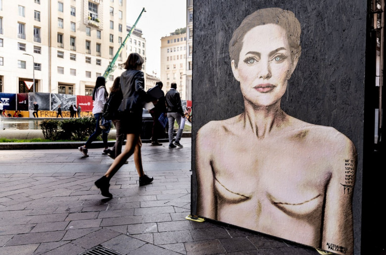 World Breast Cancer Day. Mural by Angelina Jolie with signs of mastectomy - Milan, Italy - 19 Oct 2022