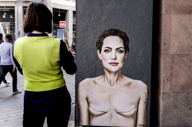 World Breast Cancer Day. Mural by Angelina Jolie with signs of mastectomy - Milan, Italy - 19 Oct 2022