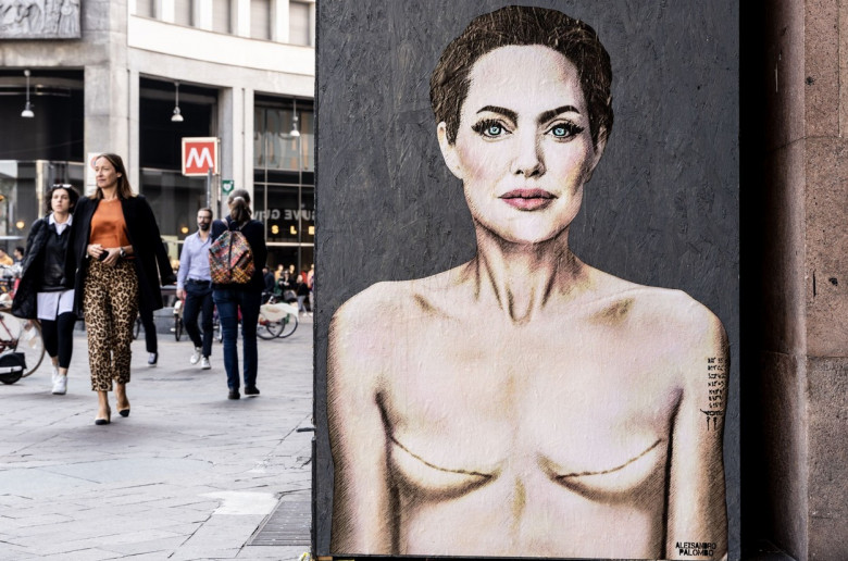 World Breast Cancer Day. Mural by Angelina Jolie with signs of mastectomy - Milan, Italy - 19 Oct 2022