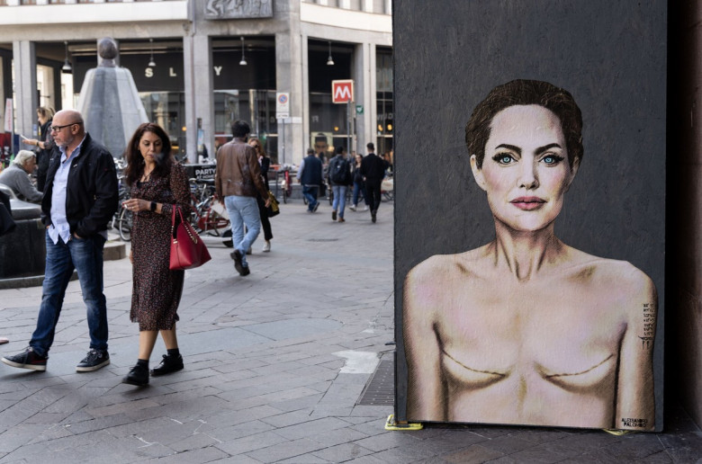 World Breast Cancer Day. Mural by Angelina Jolie with signs of mastectomy - Milan, Italy - 19 Oct 2022