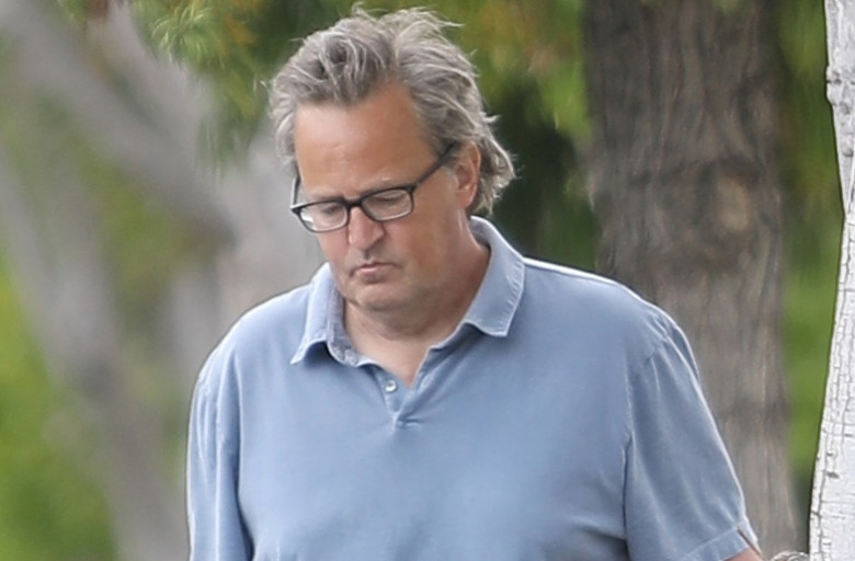 A cleaned-up Matthew Perry is seen in a rare public outing as he leaves a house in Los Angeles following a two-hour visit with friends.