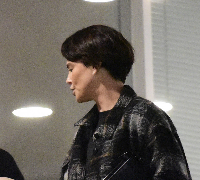 EXCLUSIVE: Charlize Theron debuts a chic new cropped hairdo on a girls night out in LA.