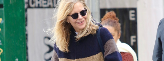 *EXCLUSIVE* Actress Meg Ryan is bundled up and all smiles during a cold windy day in NYC