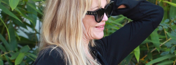 *EXCLUSIVE* Melanie Griffith smokes a cigarette while out for lunch