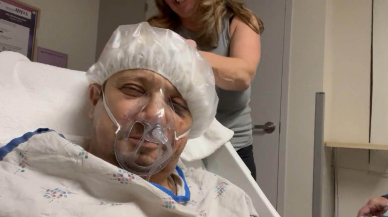 Jeremy Renner in ICU getting a head massage from his sister