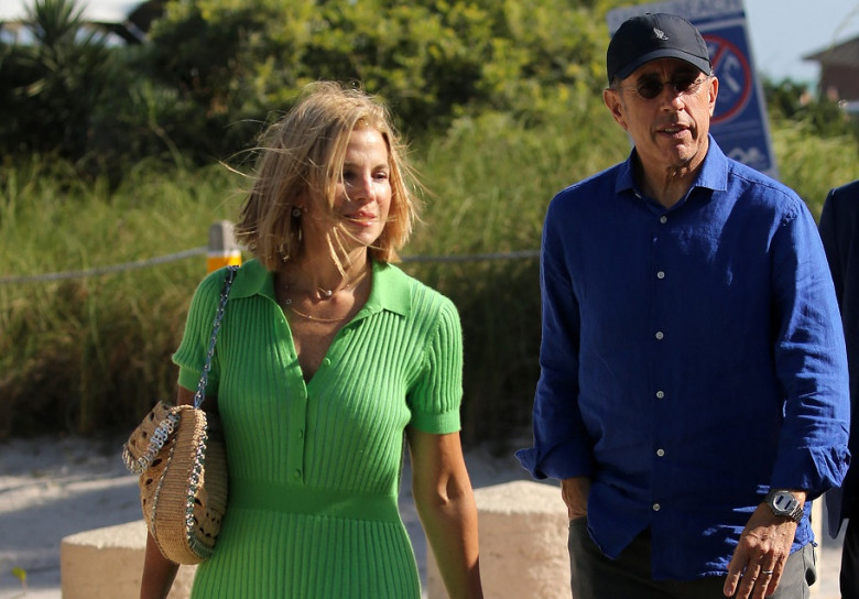 Comedian Jerry Seinfeld and wife Jessica are seen leaving a JP Morgan event as they speed off in a blue Porsche in Miami