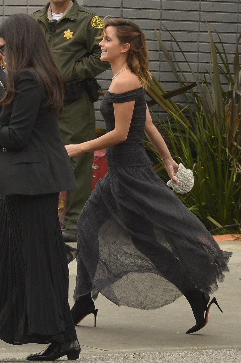 Emma Watson is pictured outside the Four Seasons Hotel