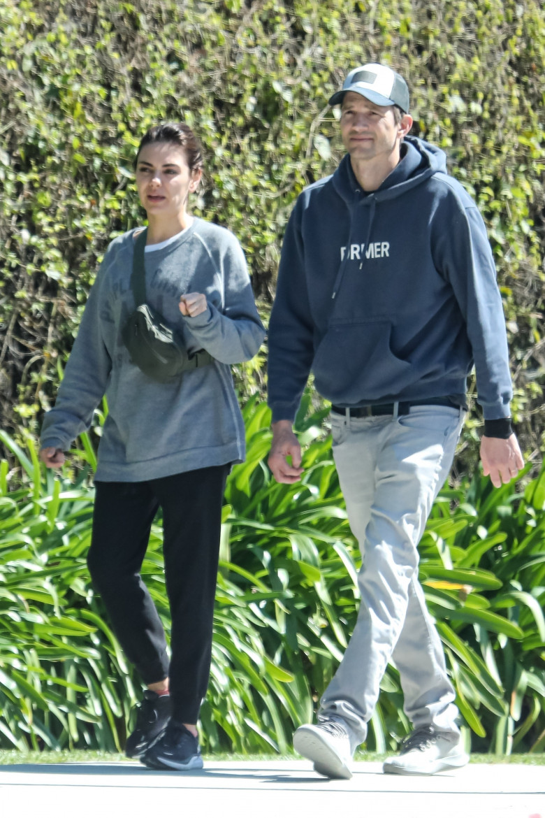 *EXCLUSIVE* Ashton Kutcher and Mila Kunis enjoy a walk around Bel Air together after returning from sweet spring break trip to Venice