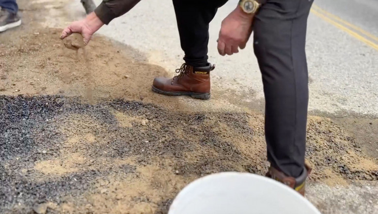 Hands-on Arnold Schwarzenegger fixes a giant pothole in his LA neighbourhood