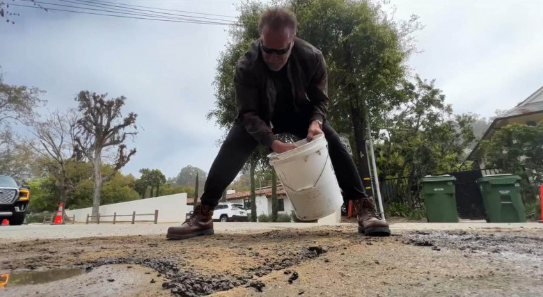 Arnold Schwarzenegger has taken it upon himself to fill two potholes