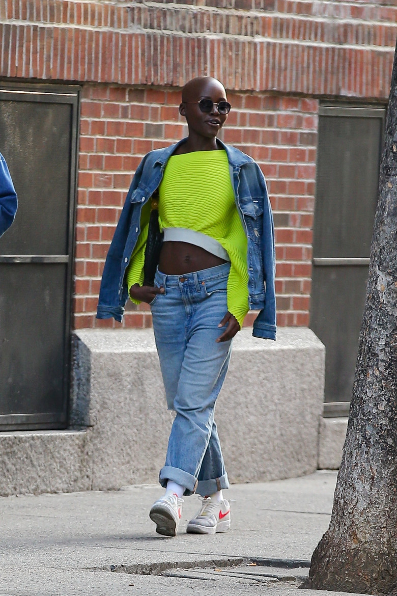 Lupita Nyong'o looks stylish without hair while out with a friend