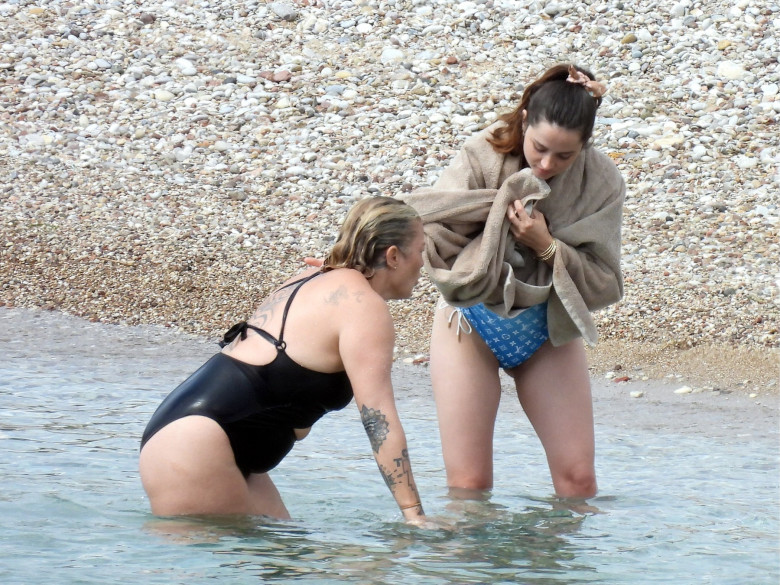 EXCLUSIVE: Ana de Armas sighted with Louis Vuitton swimsuit at the beach in Greece