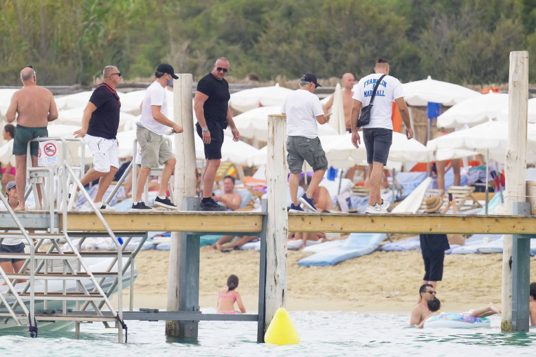 Leonardo DiCaprio arrives at the Club 55 wearing a mask during heat wave in St Tropez