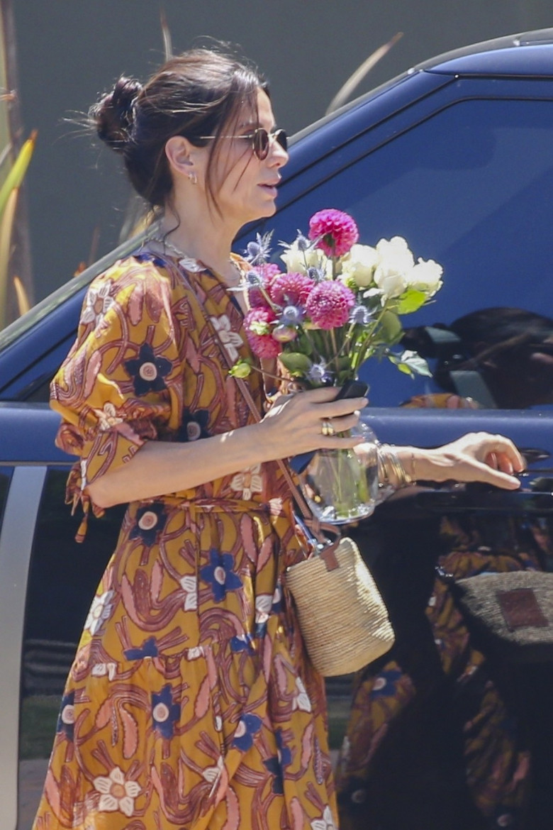 *EXCLUSIVE* Sandra Bullock spends a lovely day at a friend's house, enjoys gifts, and good times