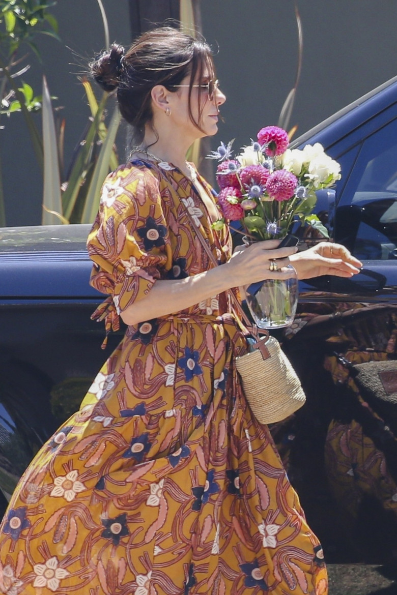 *EXCLUSIVE* Sandra Bullock spends a lovely day at a friend's house, enjoys gifts, and good times