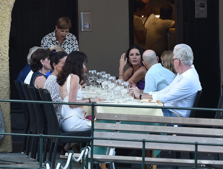 Catherine Zeta-Jones with her husband Michael Douglas and friends at the "Taverna del Marinaio" in Portofino