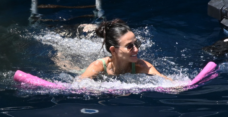 PREMIUM EXCLUSIVE: *NO WEB UNTIL 4PM EDT 14TH AUG* Demi Moore shows off her amazing curves in a daring green bikini proving she’s still sexy at 60