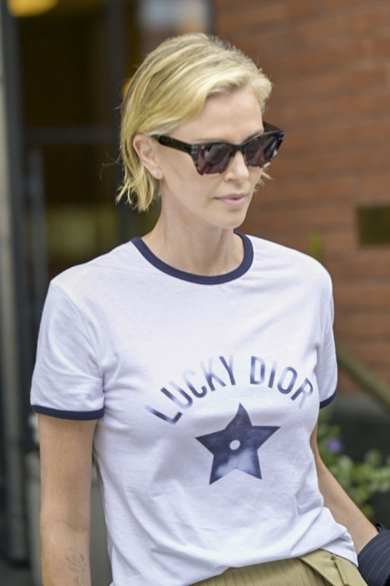 Charlize Theron heads to the US Open in New York