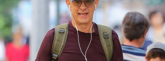 EXCLUSIVE: Yankees Fan Tom Hanks Is Spotted On A Phone Call While Walking Around In New York