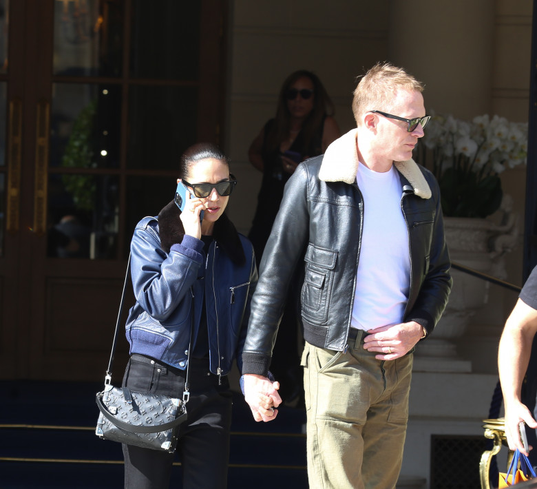 Jennifer Connelly and Paul Bettany are seen departing their hotel in Paris