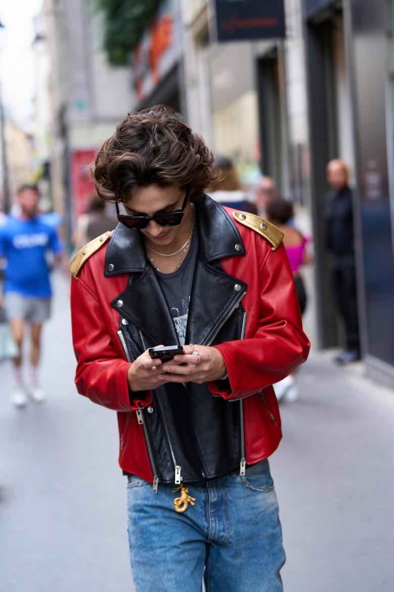 EXCLUSIVE: Timothee Chalamet Rocks A Colorful Celine Jacket In Paris After Getting Caught Holding Kylie Jenner Hand Wearing A Ring On Her Engagement Finger