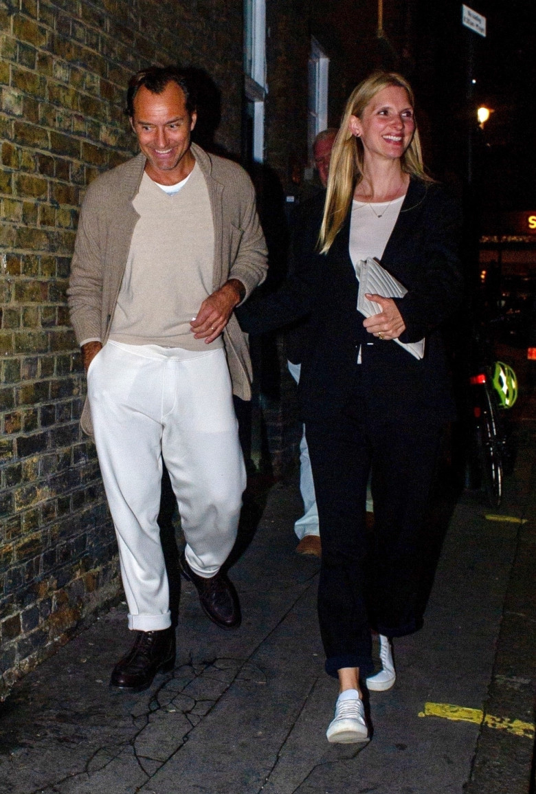 *EXCLUSIVE* Jude Law along with his wife Phillipa Coan and father in-law are all smiles after a drink at the Soho hotel