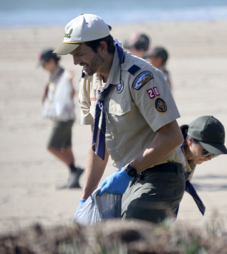 *EXCLUSIVE* Ashton Kutcher and Mila Kunis lead beach cleanup with Cub Scout Den