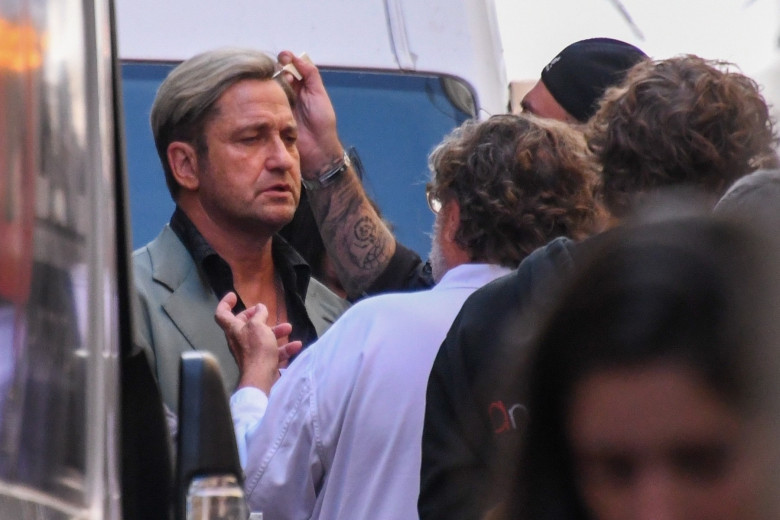 Gerard Butler and director Julian Schnabel were spotted on the set of the film "In the hand of Dante"