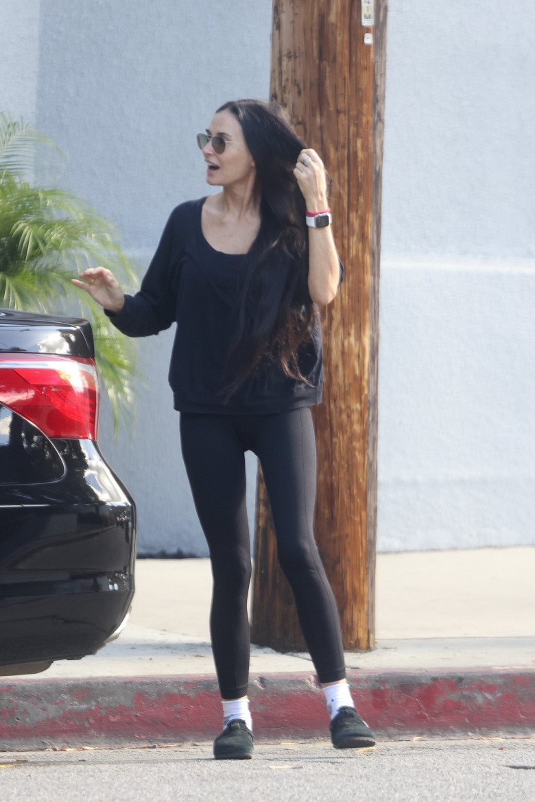*EXCLUSIVE* Demi Moore exits a yoga class with a friend
